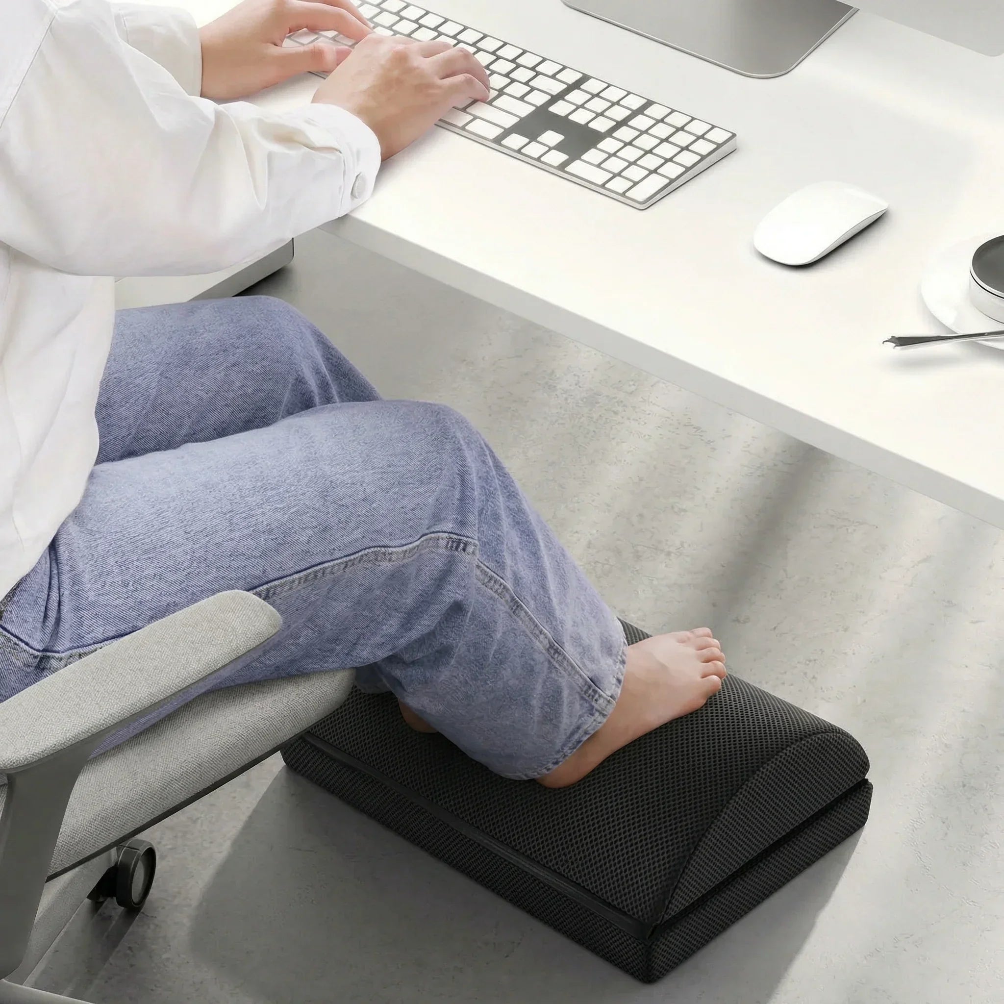 Bacol Foot Ease Rest – In Use Under Desk
